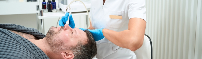 Expert performing non-surgical nose job at DSL Clinic